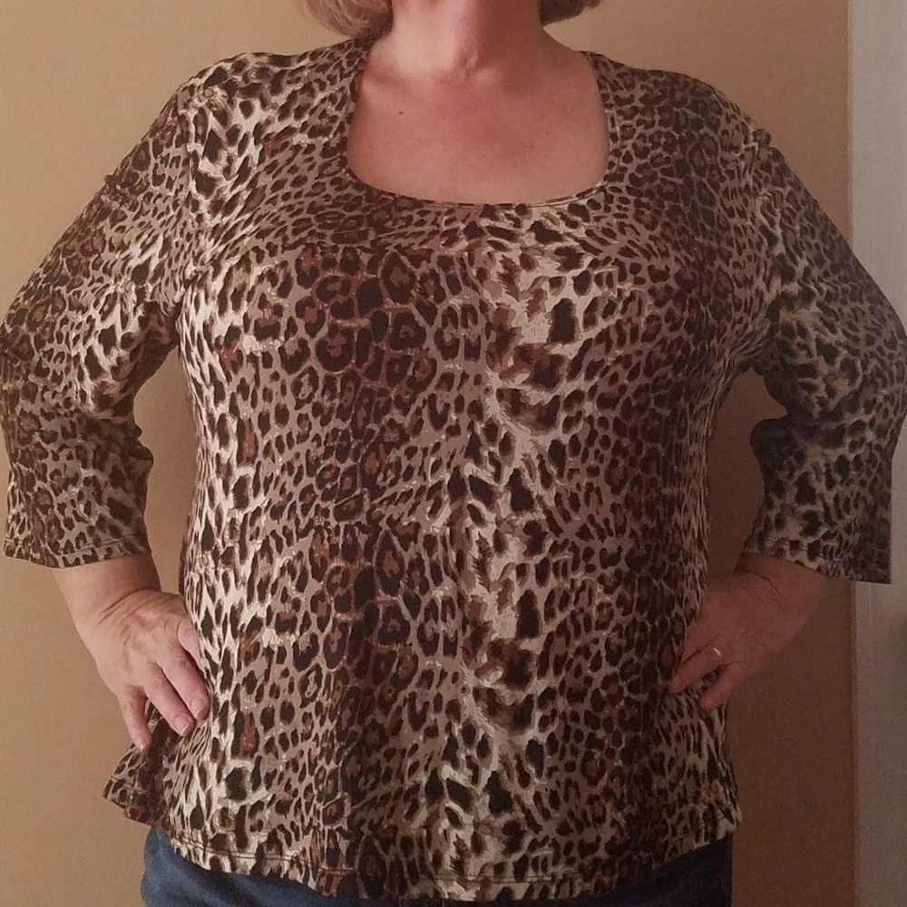Caribe liquid knit animal print top.